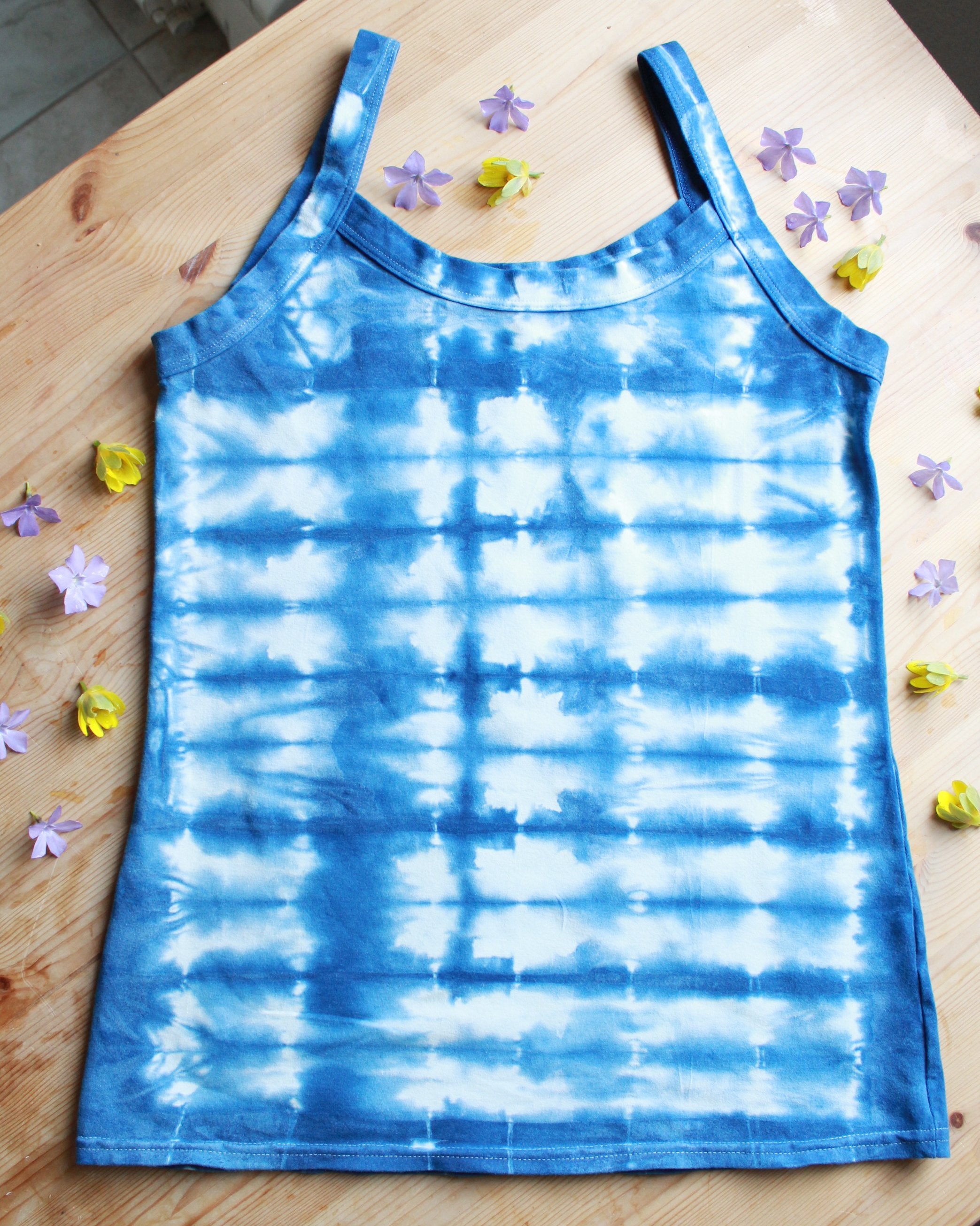Flat lay of Thunderpants organic cotton Camisole in limited edition hand dyed indigo shibori tie dye.