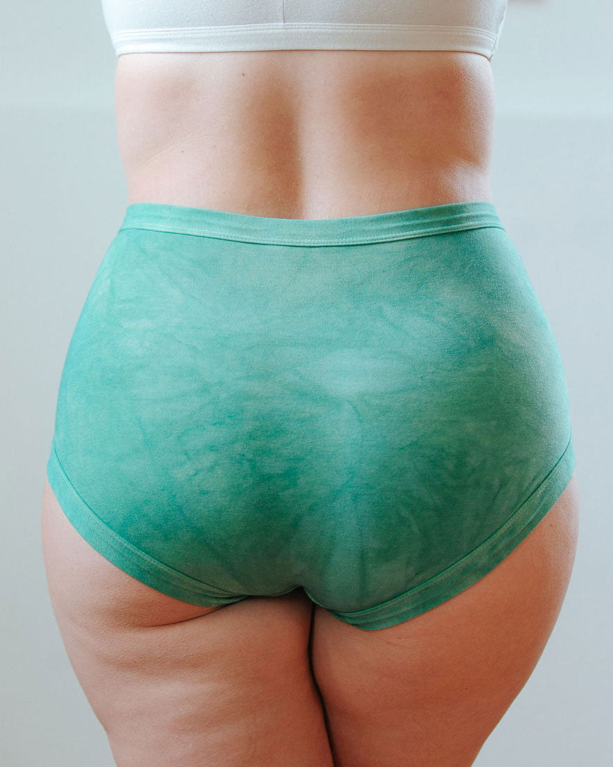 Photo of a bum showing Thunderpants Organic Cotton original style underwear in hand dyed Emerald color on a model.