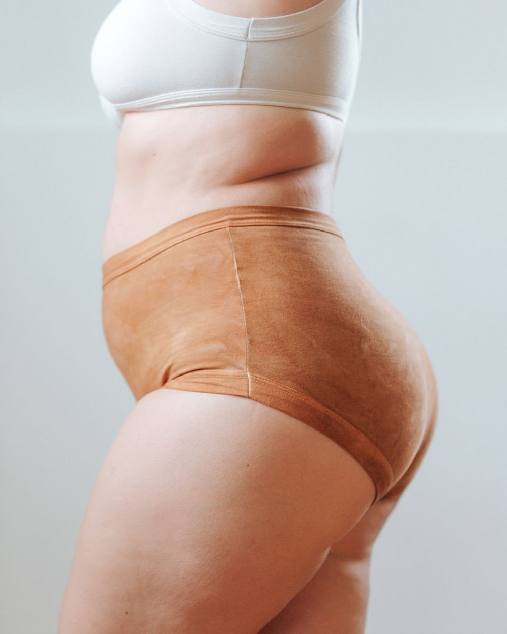Side photo showing Thunderpants Organic Cotton original style underwear in hand dyed Espresso color on a model.