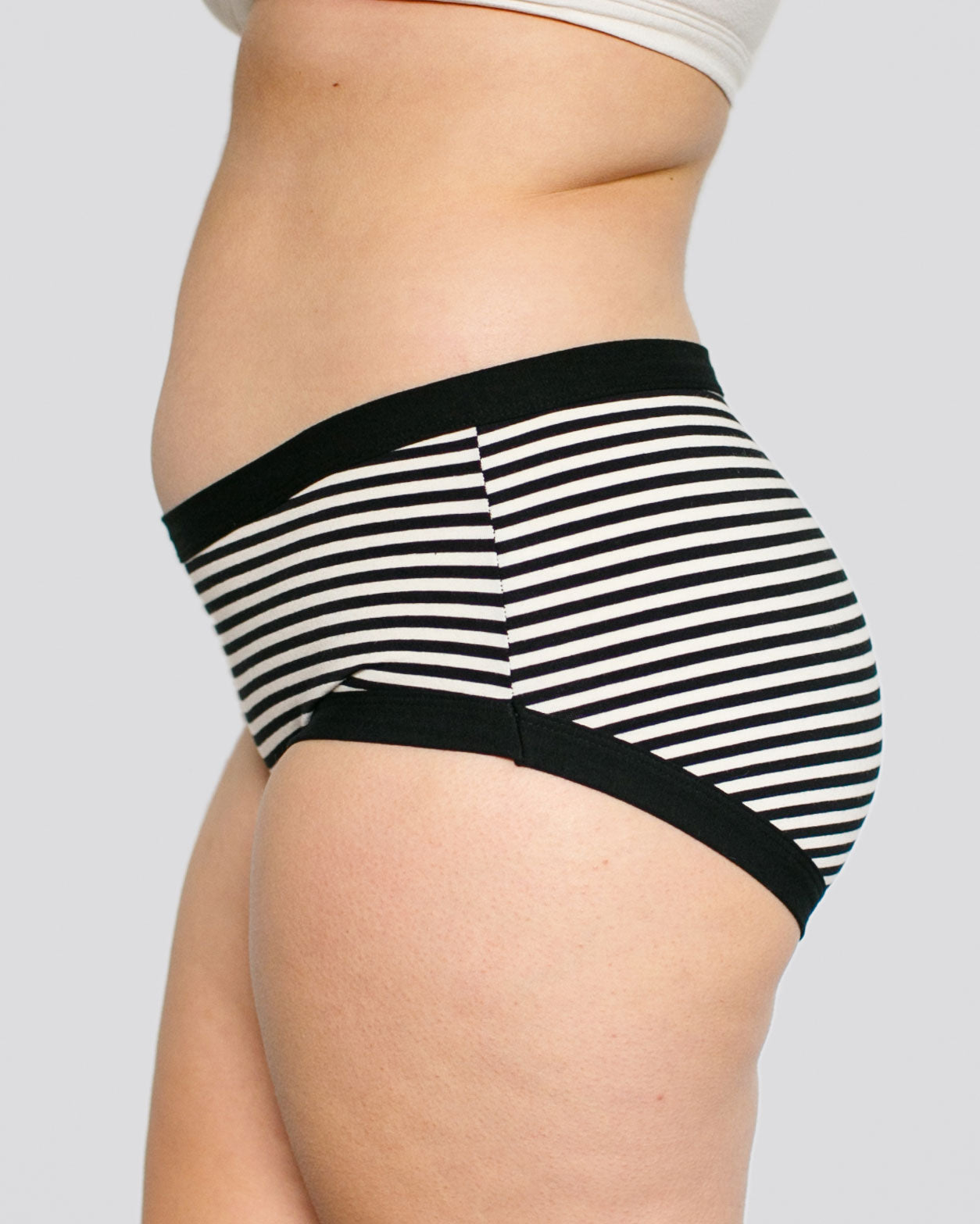 Model's side wearing Thunderpants organic cotton Hipster style Black and White Stripes.