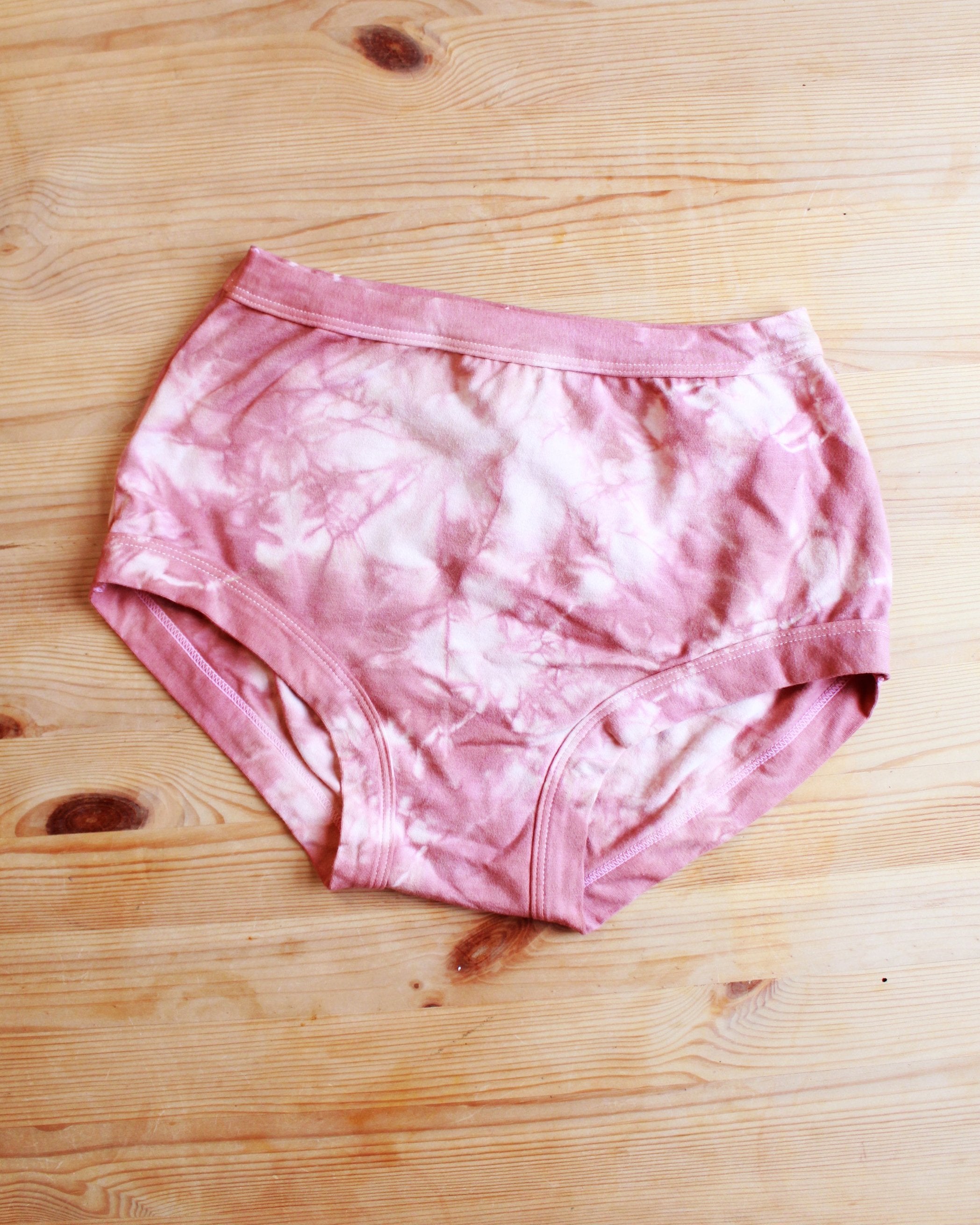 Front flat lay of Thunderpants organic cotton Women’s Original style underwear in limited edition hand dye pink tie dye.