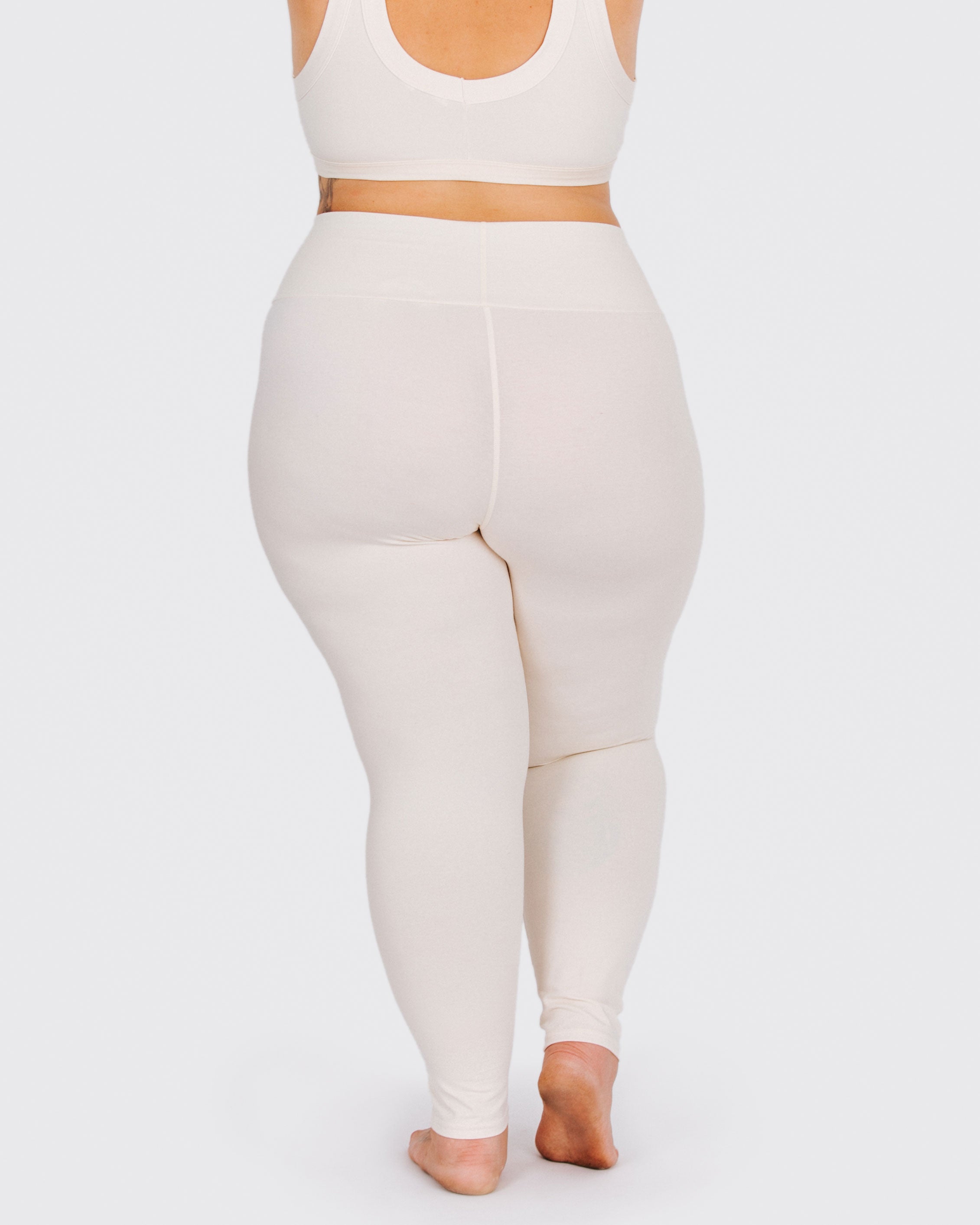 Fit photo from the back of Thunderpants organic cotton Leggings in off-white on a model.