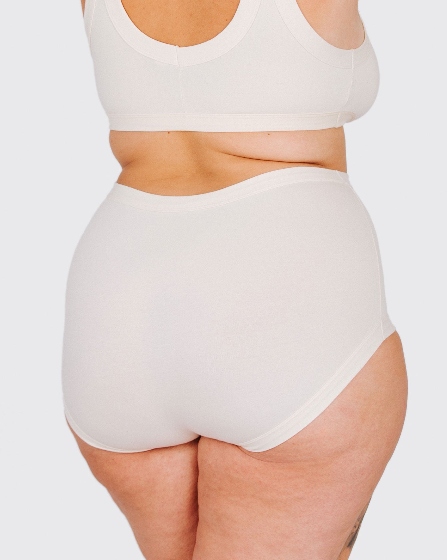 Fit photo from the back of Thunderpants organic cotton Original style underwear in off-white, showing a wedgie-free bum, on a model.