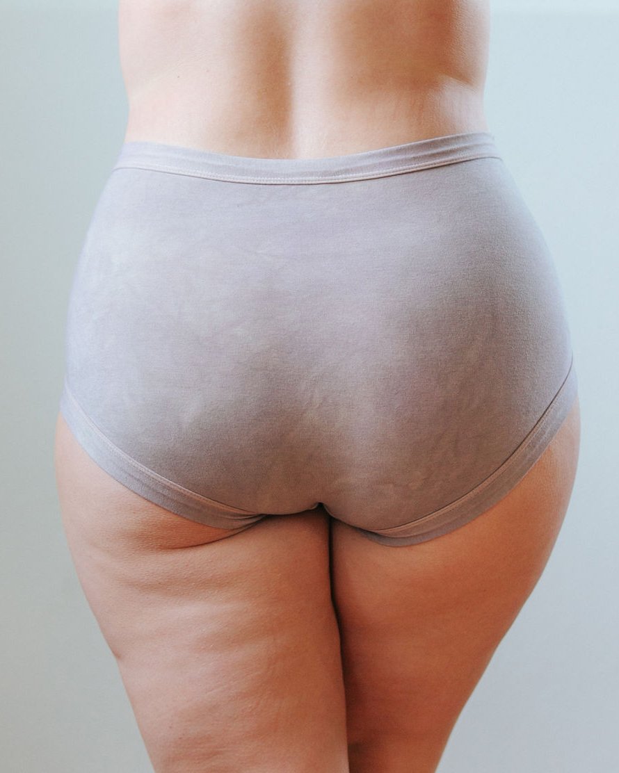 Photo of a bum showing Thunderpants Organic Cotton original style underwear in hand dyed Shiitake color on a model.